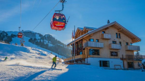 Отель Rinderberg Swiss Alpine Lodge, Цвайзиммен